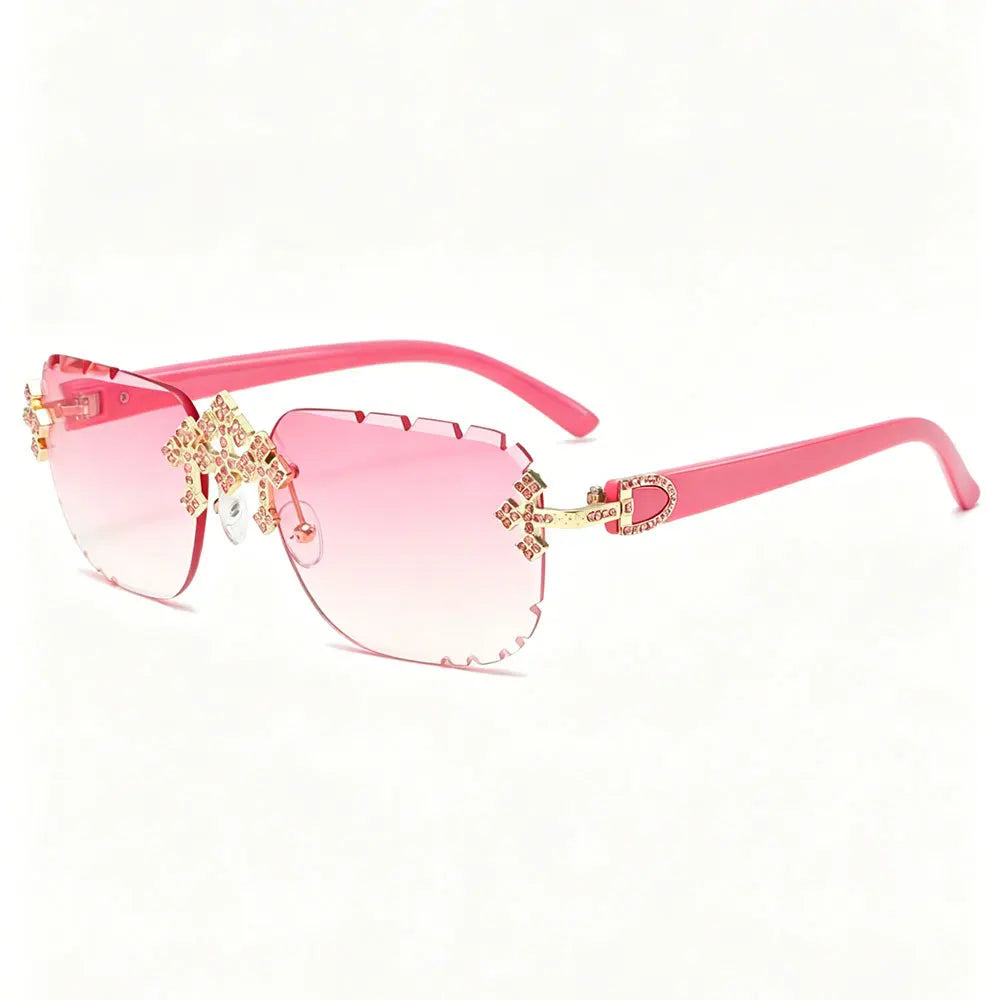 "GAFAS DE SOL CON PIEDRAS BRILLANTES", o "GAFAS CON DIAMANTES SIMULADOS"