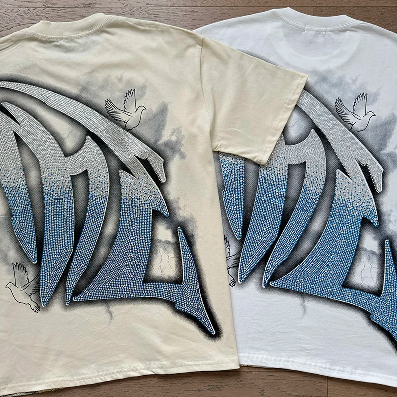 "Camiseta Unisex con estampado de Ángel, mezcla de tejidos, ideal para el streetwear en pareja. Cuello redondo, manga corta y un diseño moderno para brillar en verano."
